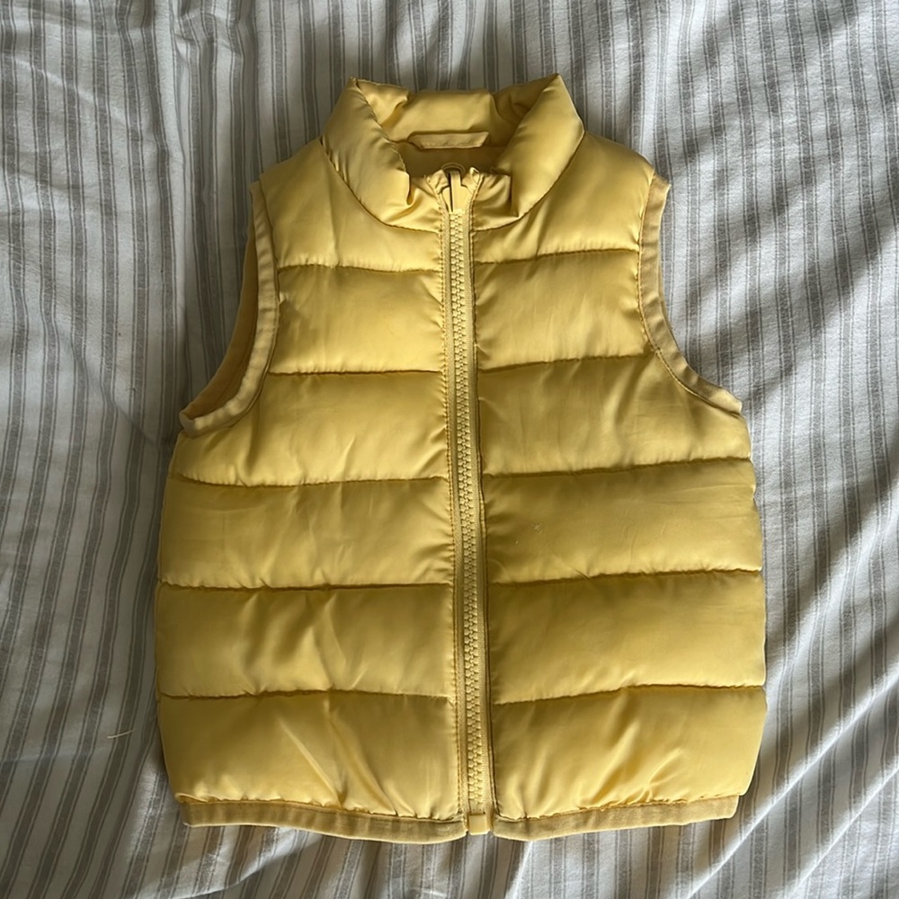 Yellow puffer vest